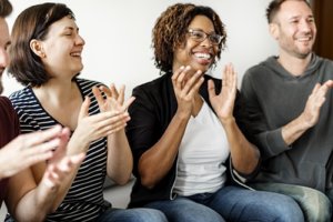 Happy group of people at a Houston mental health treatment center