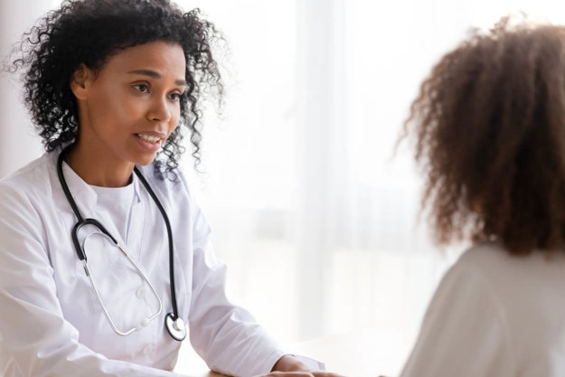 doctor talking to patient about Dual Diagnosis Programs in Jacksonville FL